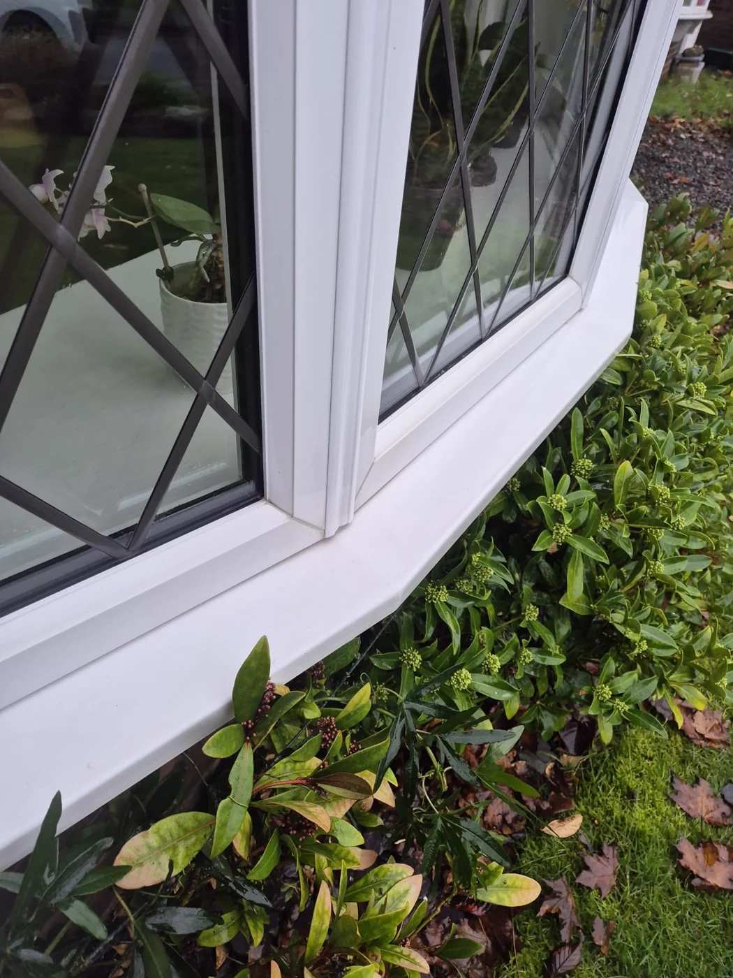 Leaded window, frame and sill after cleaning